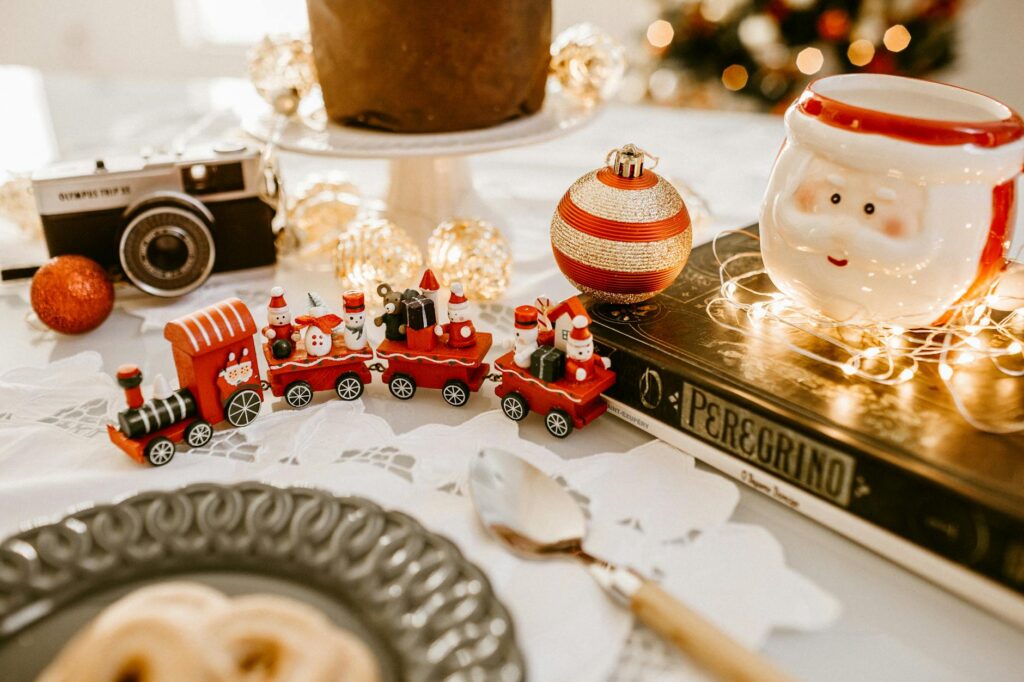 red train toy beside christmas decors